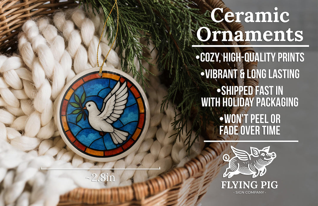 Ceramic ornaments, featuring a stained glass design of a dove in flight, are displayed in a wicker basket.
