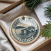 A decorative ornament with the text "DUBROVNIK CHANNEL CROATIA" printed on it, surrounded by greenery.