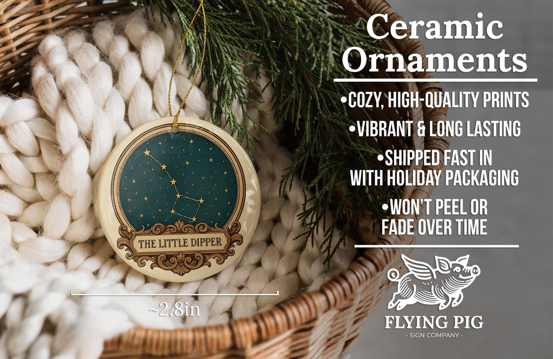 Ceramic ornaments, including a starry night sky ornament, are displayed in a wicker basket.