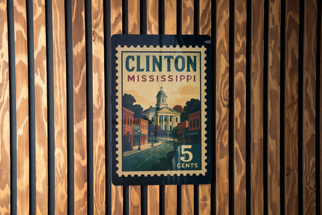 A 5 cent postage stamp from Mississippi featuring a town scene.