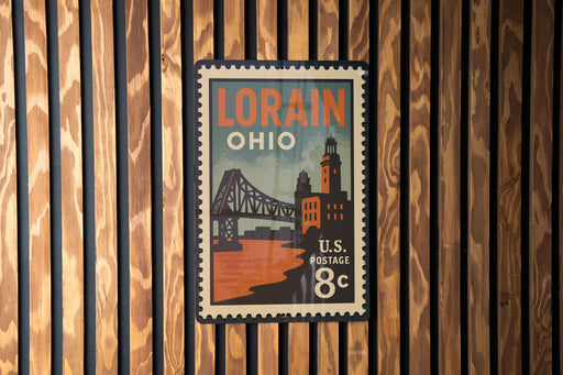A vintage-style postage stamp from the United States, featuring an illustration of a bridge and buildings, mounted on a wooden wall.