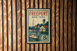 A vintage postage stamp from New York featuring a boat on the water and a building with a tower, mounted on a wooden wall.