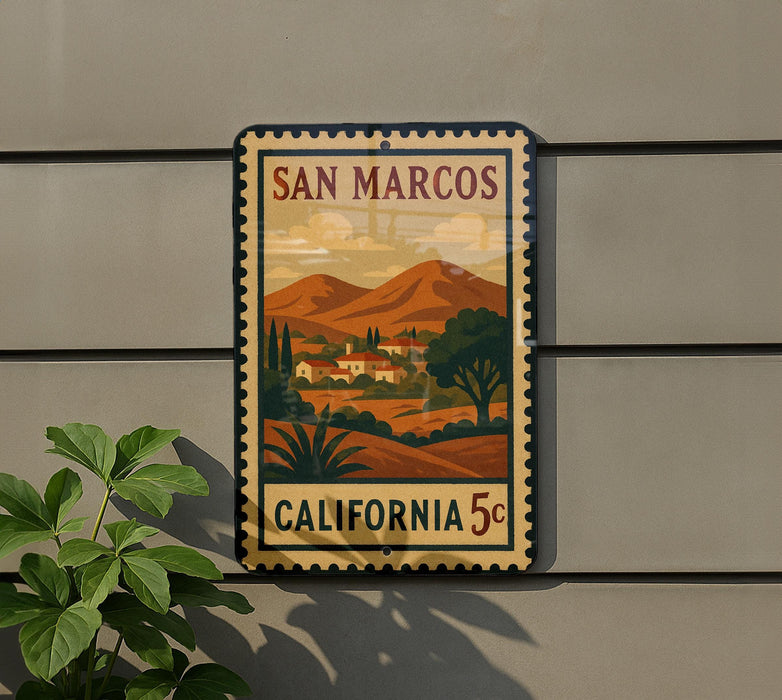 A vintage-style postage stamp depicting a scenic landscape of San Marcos, California, with mountains, buildings, and trees.