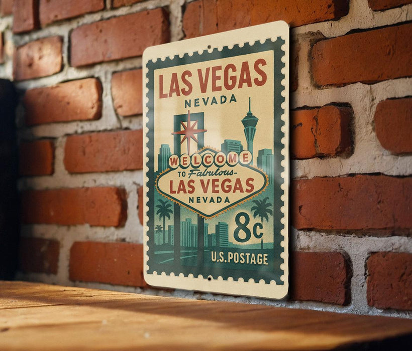 A vintage-style metal sign that reads "Welcome to Fabulous Las Vegas Nevada" and features the iconic Las Vegas skyline.