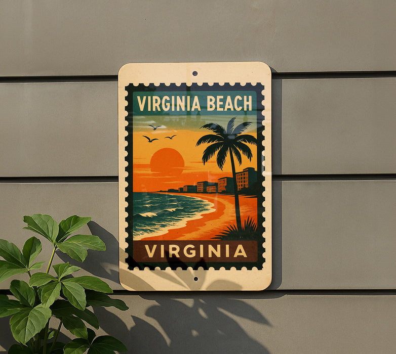 A vintage-style sign for Virginia Beach, featuring a palm tree, sunset, and beach scene, mounted on a wall.