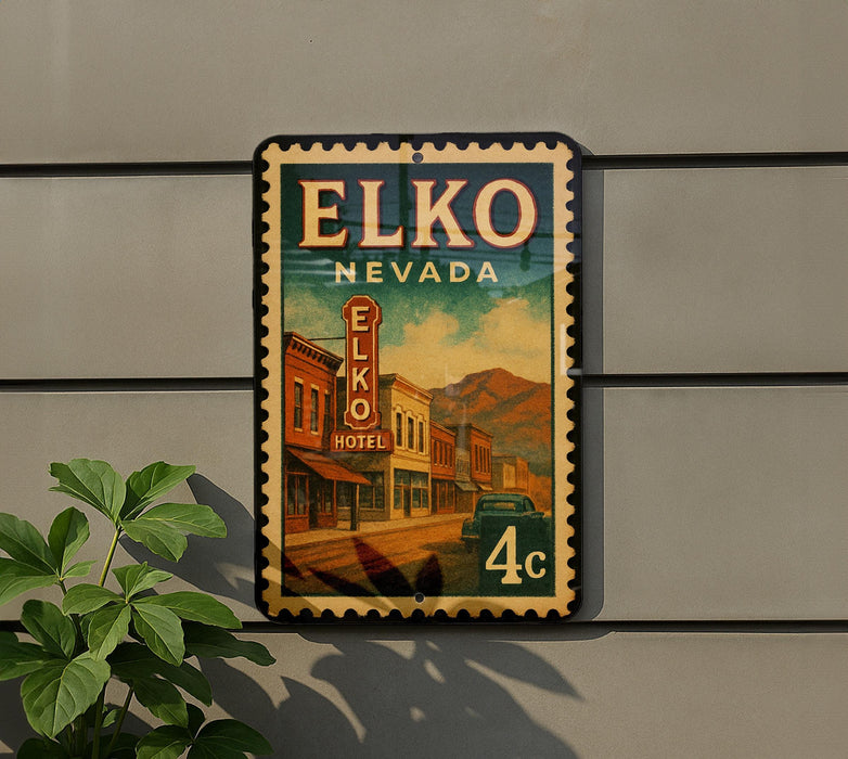 A vintage-style sign for the Elko Nevada Hotel, featuring a colorful illustration of a small town street with buildings and a car.