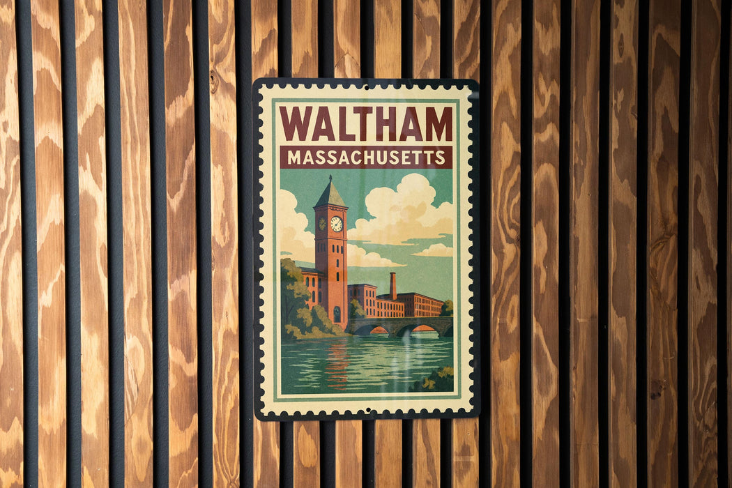 A vintage-style poster of Waltham, Massachusetts, featuring a clock tower and a river, is displayed on a wooden wall.
