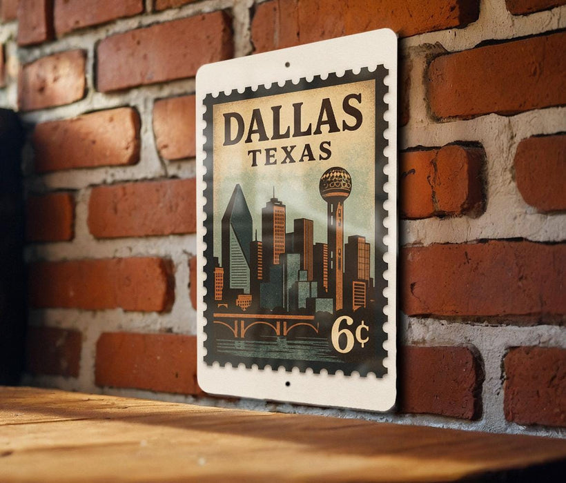 A metal sign with a vintage-style illustration of the Dallas skyline, mounted on a brick wall.