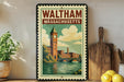 A framed vintage-style poster of Waltham, Massachusetts, featuring a clock tower and a river, is displayed on a wall next to a wooden cutting board and a potted plant.