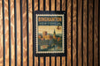 A vintage postage stamp from Binghamton, New York, featuring a cityscape and a bridge.