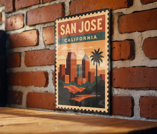 A vintage-style metal sign with the text "SAN JOSE CALIFORNIA" and an illustration of a city skyline with palm trees.