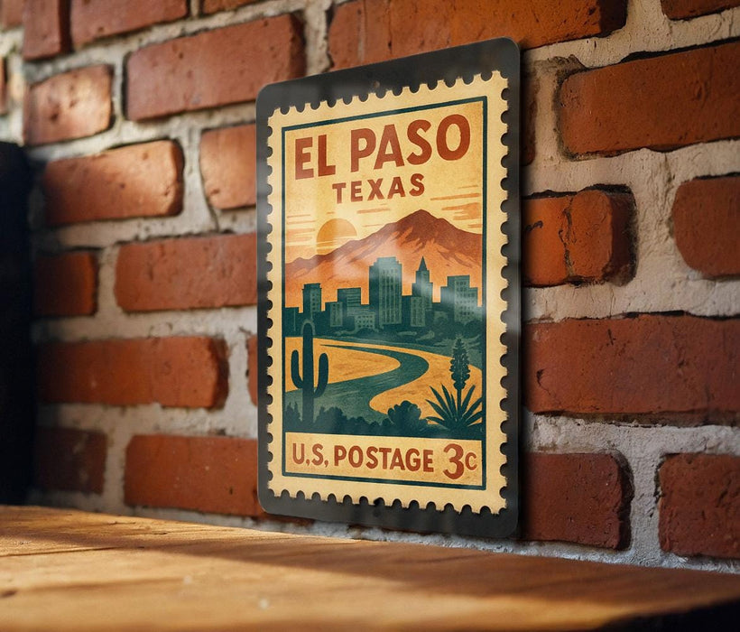 A vintage-style postage stamp depicting the city of El Paso, Texas, with mountains in the background and a desert landscape.