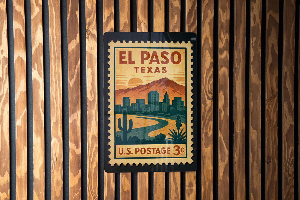 A vintage-style postage stamp from the United States, featuring the city of El Paso, Texas, with mountains in the background.