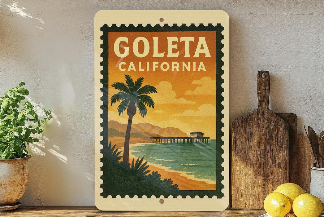 A vintage-style postage stamp depicting a beach scene with palm trees and a pier, hanging on a wall next to a wooden cutting board and a potted plant.