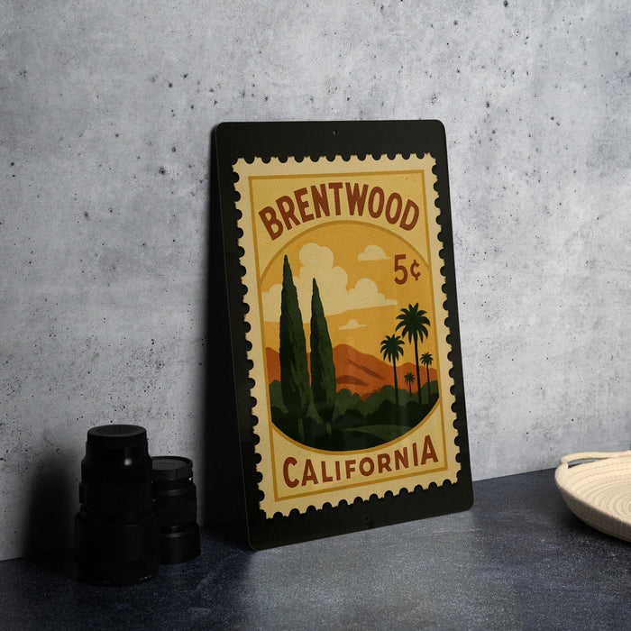 A framed stamp depicting a scenic landscape of Brentwood, California, with palm trees and mountains in the background.
