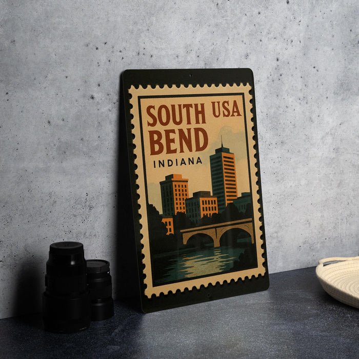 A framed poster of the city of Bend, Indiana, is displayed on a table.