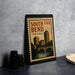 A framed poster of the city of Bend, Indiana, is displayed on a table.