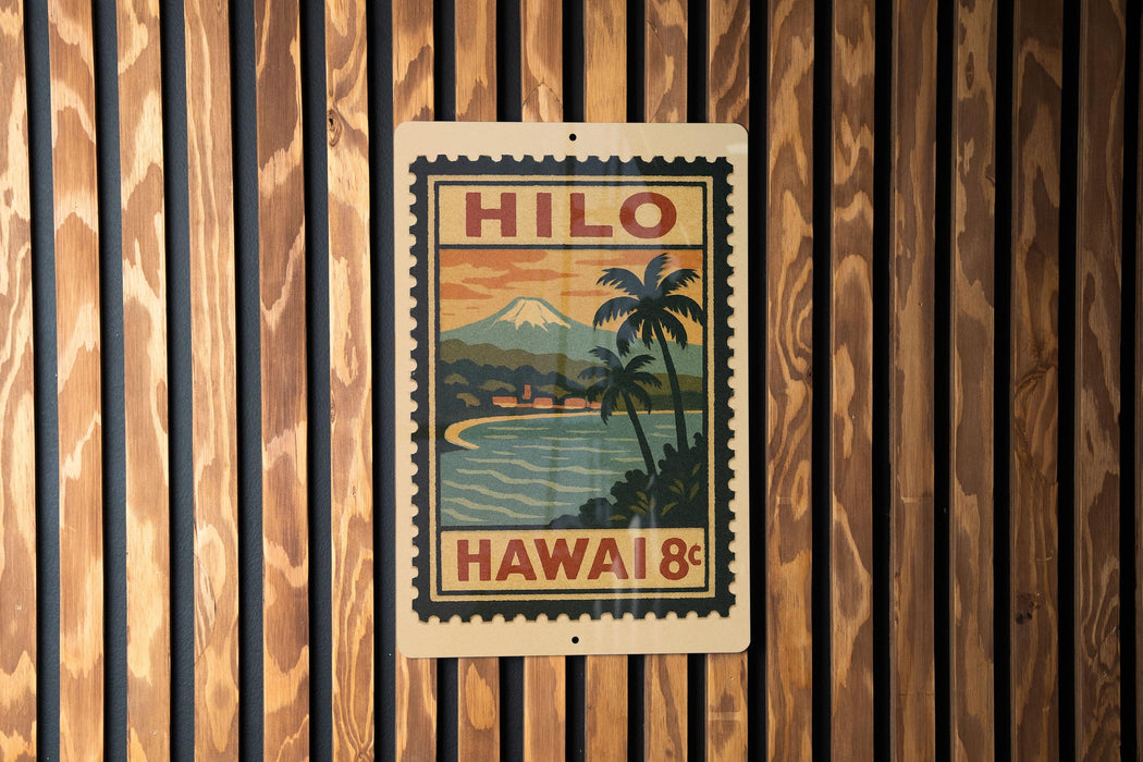 A vintage-style stamp or sign with the text "HILO" and "HAWAII 18¢" displayed on a wooden wall.