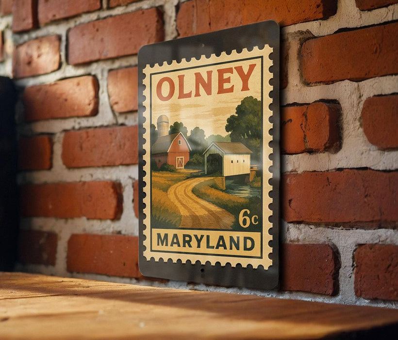 A metal sign with a vintage-style illustration of a rural scene, mounted on a brick wall.