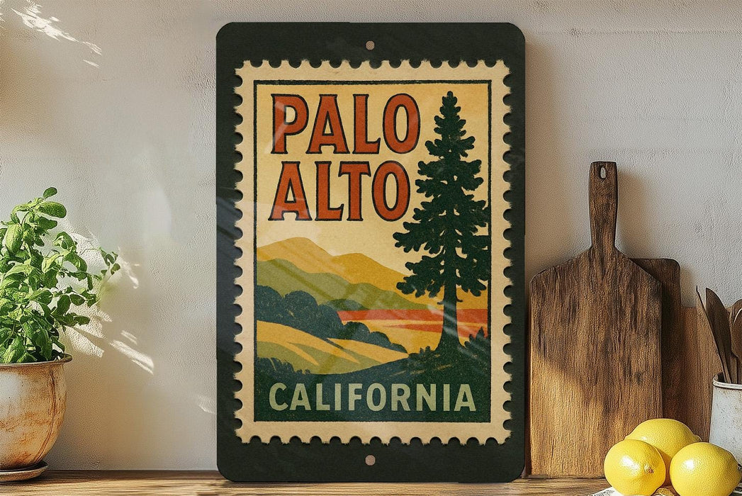A framed vintage-style poster of the state of California, featuring a scenic landscape with mountains and a pine tree, is displayed on a shelf next to a wooden cutting board and some kitchen utensils.