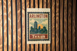 A vintage-style metal sign with the text "ARLINGTON TEXAS" displayed on it, mounted on a wooden wall.