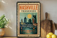 A vintage-style metal sign with the text "NASHVILLE TENNESSEE" and an illustration of a city skyline with a bridge, displayed on a shelf next to a wooden cutting board and some potted plants.