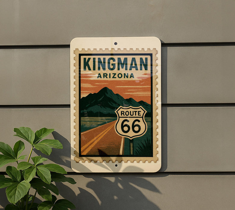 A sign for the Route 66 in Arizona, featuring a mountain landscape and a road.