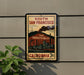 A vintage-style metal sign with the text "SOUTH SAN FRANCISCO" and "THE INDUSTRIAL CITY" is displayed on a wall, with a plant to the left.