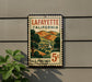A vintage postage stamp from Lafayette, California, featuring a scenic landscape with mountains, trees, and a church.