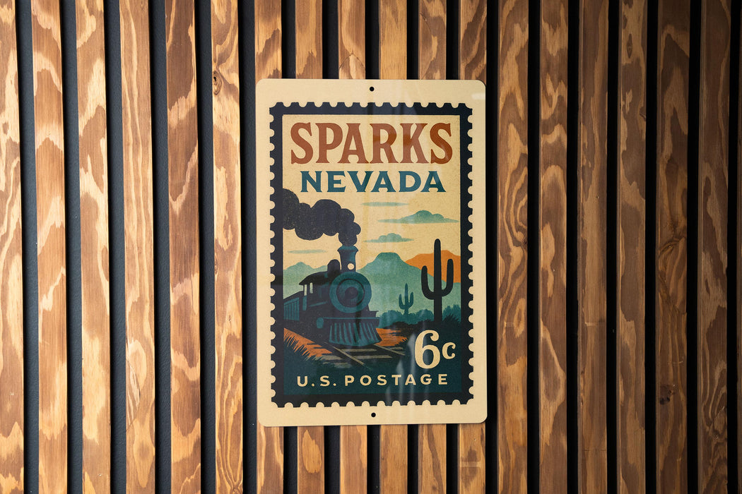 A vintage U.S. postage stamp from Sparks, Nevada, featuring a steam locomotive and desert landscape.