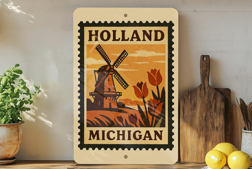 A framed poster of a windmill and tulips, with the text "HOLAND MICHIGAN" on it, is displayed on a shelf next to a wooden cutting board and some kitchen utensils.