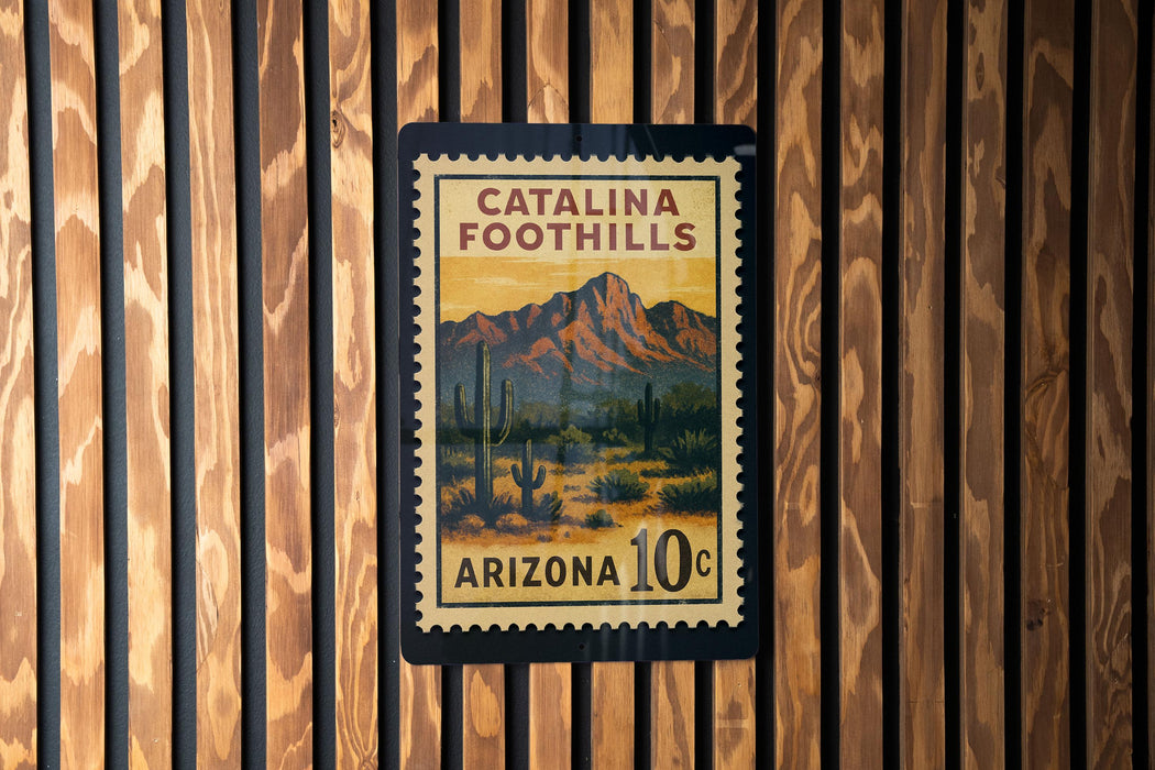 A vintage postage stamp from Catalina Foothills, Arizona, featuring a desert landscape with mountains in the background.