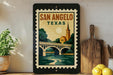 A framed poster of a bridge and trees, with the text "SAN ANGELO TEXAS" displayed prominently.