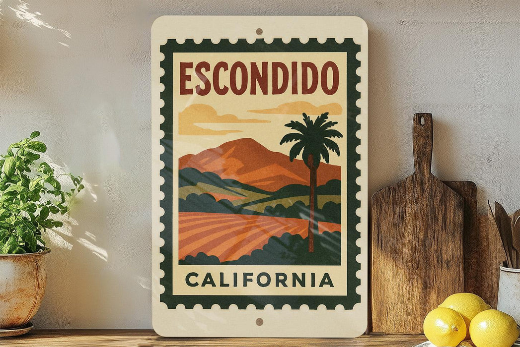 a vintage-style sign for Escondido, California, with a palm tree and a landscape scene, placed on a shelf next to a wooden cutting board and some potted plants.