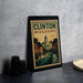 A framed poster of Clinton, Mississippi, with a vintage-style illustration of the town and a denomination of 5 cents.