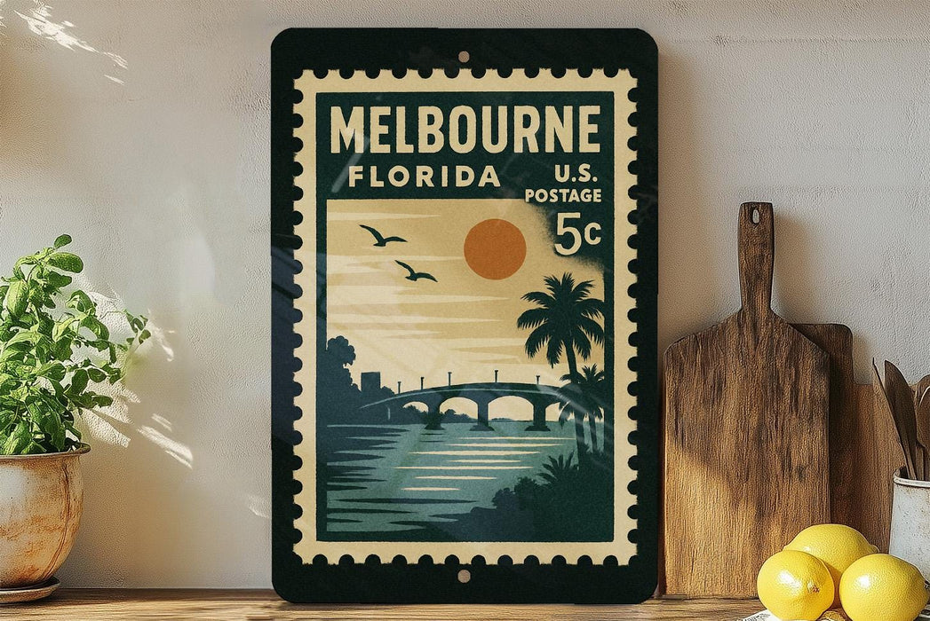 A vintage postage stamp from Melbourne, Florida, featuring a scenic illustration of a bridge, palm trees, and a sunset over the water.