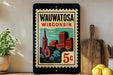 A framed poster of a cityscape with a church and buildings, featuring the text "Wauwatosa, Wisconsin" and a 5 cent postage stamp.