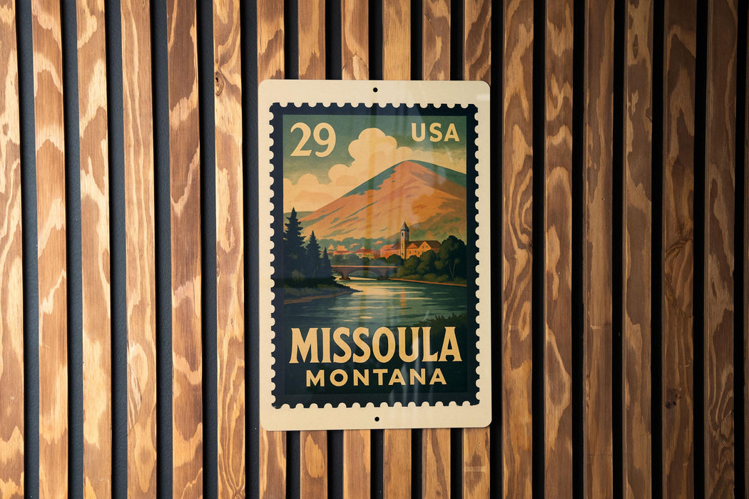 A vintage-style postage stamp from the United States, featuring a scenic landscape of Missoula, Montana.