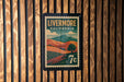A vintage-style postage stamp from Livermore, California, featuring a landscape with mountains and a tree.