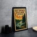 A framed poster of Hot Springs Village, Arkansas, featuring a scenic landscape with a lake, pine trees, and a boat on the water.