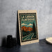 A framed poster of the scenic La Canada Flintridge in California, featuring a mountain landscape and a winding road.