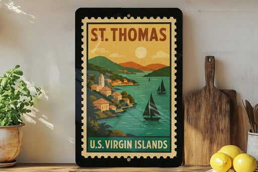 A framed vintage postage stamp depicting St. Thomas, the U.S. Virgin Islands, with a scenic coastal landscape and sailboats.