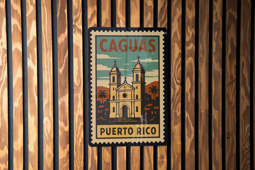 A vintage-style poster of a church with a tropical landscape in the background, mounted on a wooden wall.