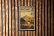A vintage California 5c postage stamp with a rural landscape and a barn, displayed on a wooden wall.