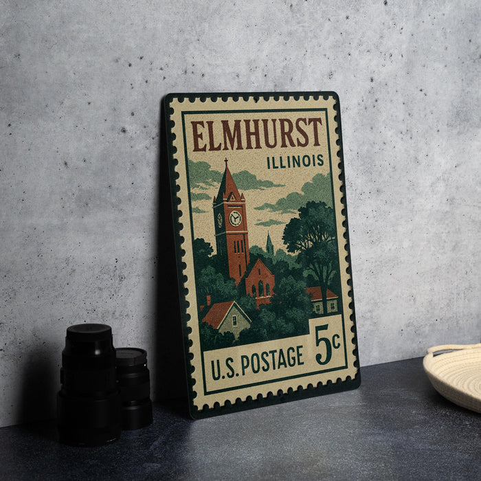 A vintage postage stamp from Illinois, featuring a clock tower and a rural landscape, placed on a table next to some black camera lenses.