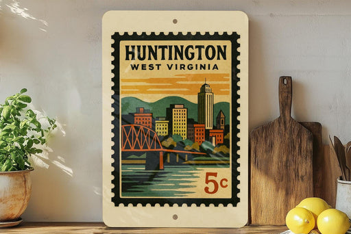 A vintage-style stamp depicting the city of Huntington, West Virginia, with a bridge and buildings in the background.