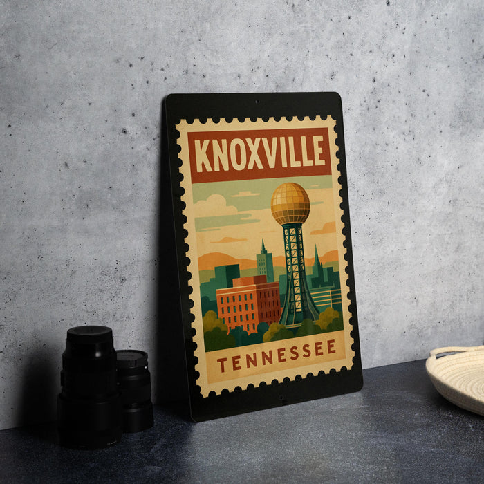 A framed poster of Knoxville, Tennessee, featuring a stylized illustration of the city skyline and the Tennessee State Capitol building.