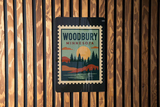 A vintage-style stamp or sign with the text "WOODBURY MINNESOTA" displayed on a wooden wall.