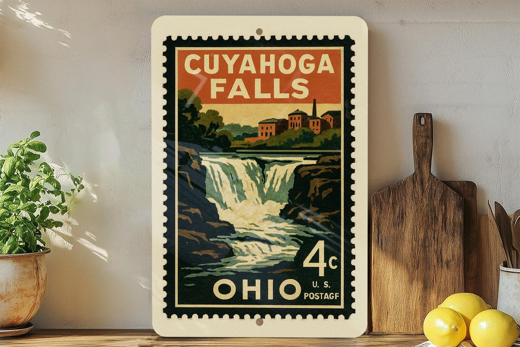 a vintage-style postage stamp from Ohio, depicting a waterfall and a town, placed on a shelf next to a wooden cutting board and some lemons.