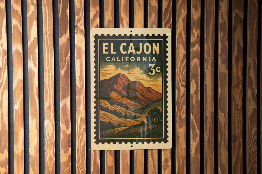 A vintage-style postage stamp from El Cajon, California, featuring a mountain landscape.